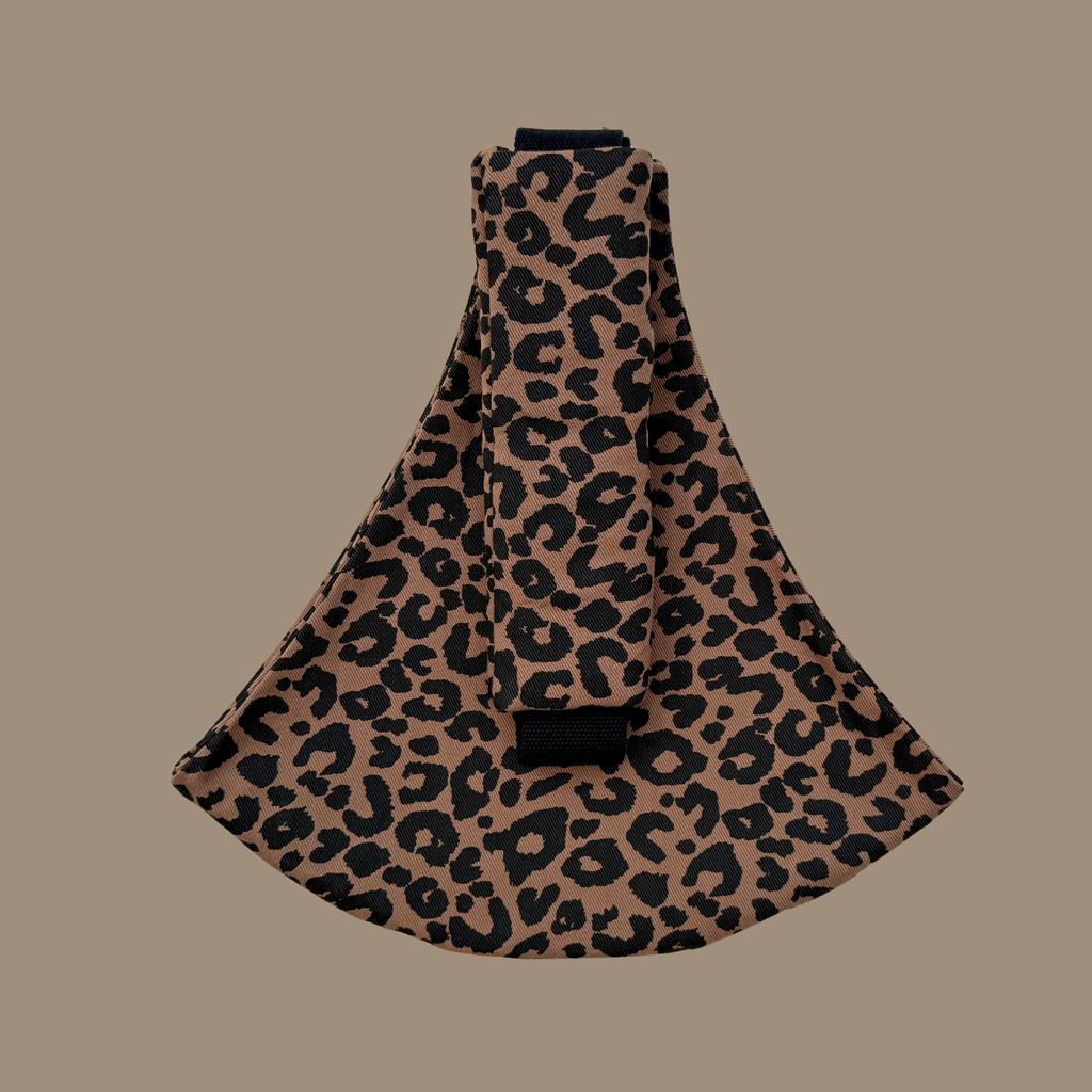 Leopard toddler hip carrier view - lightweight baby carrier