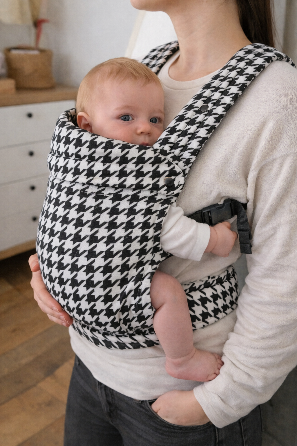 Parent wearing black houndstooth ergonomic baby carrier with infant - soft-structured toddler sling carrier UK